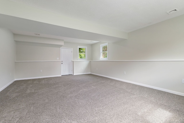 231 Lincolndale Dr, Waterbury, CT 06704 - carpeted empty room featuring baseboards