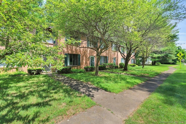 177 New Britain Ave Unit 177, Farmington, CT 06085 - view of front facade featuring a front yard