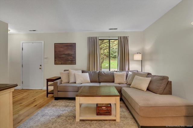 177 New Britain Ave Unit 177, Farmington, CT 06085 - living area with light wood finished floors and baseboards