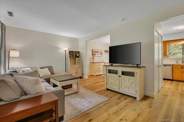 177 New Britain Ave Unit 177, Farmington, CT 06085 - living area featuring light wood-style flooring