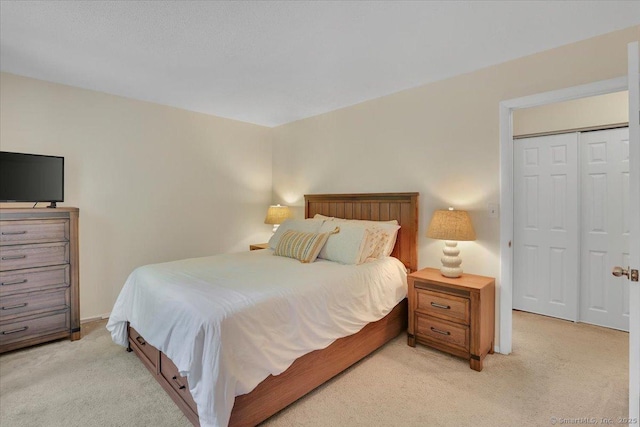 177 New Britain Ave Unit 177, Farmington, CT 06085 - bedroom featuring light carpet and a closet
