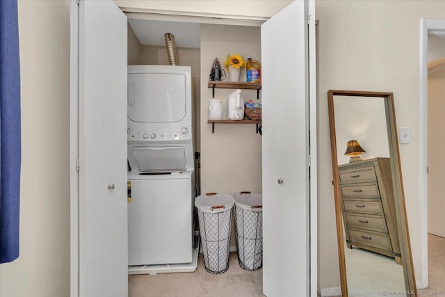 177 New Britain Ave Unit 177, Farmington, CT 06085 - washroom featuring stacked washer / dryer and carpet flooring