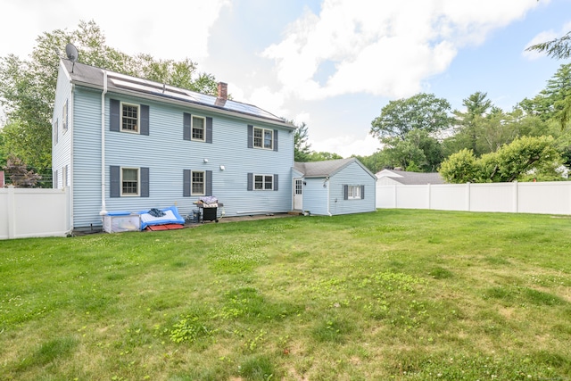 117 Woodside St, Putnam, CT 06260 - back of property featuring a chimney