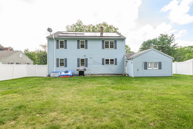 117 Woodside St, Putnam, CT 06260 - rear view of property with a chimney and a fenced backyard