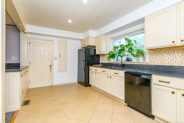 117 Woodside St, Putnam, CT 06260 - kitchen featuring black appliances, tasteful backsplash, dark countertops, light tile patterned floors, and recessed lighting