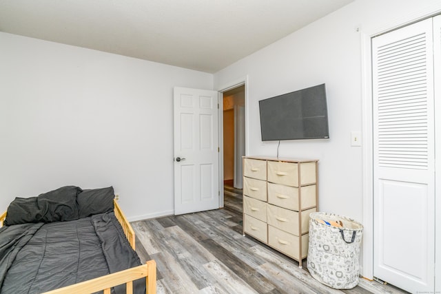 117 Woodside St, Putnam, CT 06260 - bedroom with light wood finished floors and baseboards