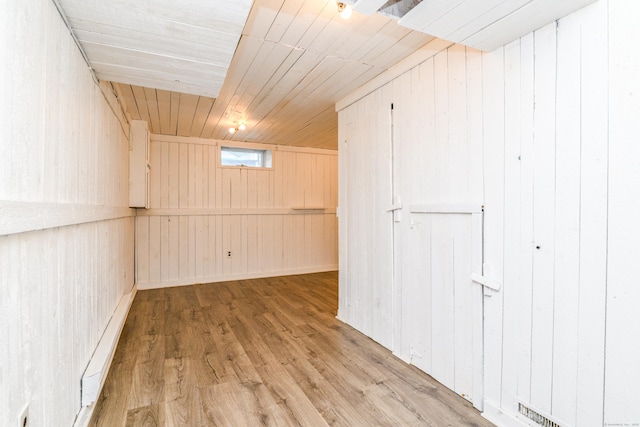 117 Woodside St, Putnam, CT 06260 - basement with wood walls, wood finished floors, and wooden ceiling