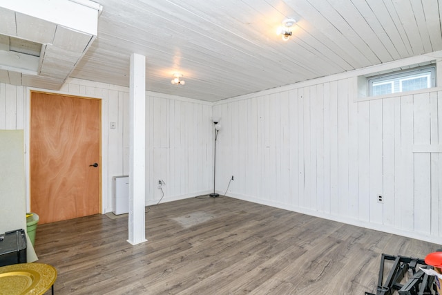 117 Woodside St, Putnam, CT 06260 - basement featuring wood finished floors, wood walls, and wooden ceiling