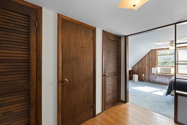 8 Nelson Dr, East Lyme, CT 06333 - unfurnished bedroom featuring light wood-style flooring, lofted ceiling, and cooling unit
