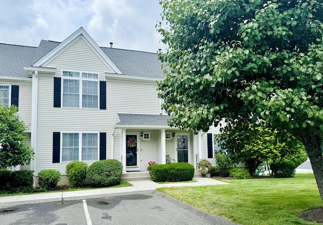 6005 Hancock Dr Unit 6005, Danbury, CT 06811 - view of front of property featuring a shingled roof and a front yard
