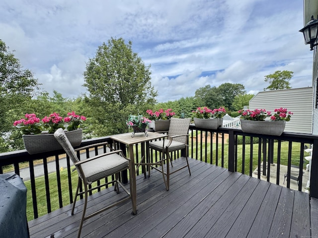 6005 Hancock Dr Unit 6005, Danbury, CT 06811 - wooden deck with outdoor dining area and a lawn