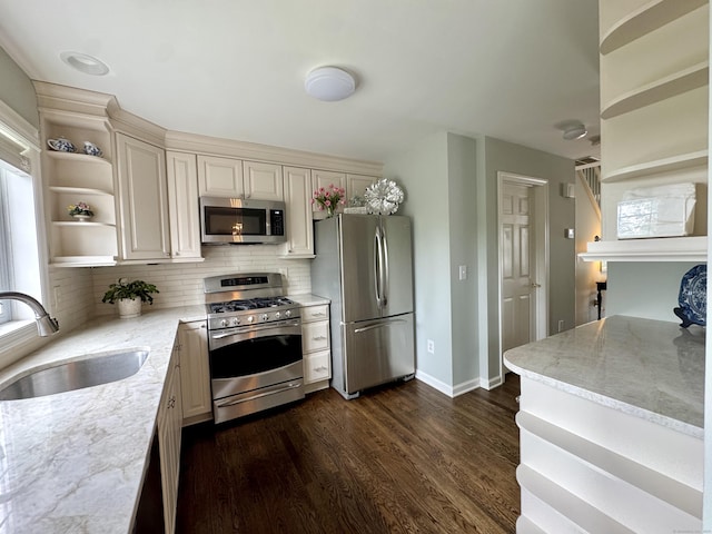 6005 Hancock Dr Unit 6005, Danbury, CT 06811 - kitchen with appliances with stainless steel finishes, open shelves, tasteful backsplash, dark wood-style flooring, and light stone counters