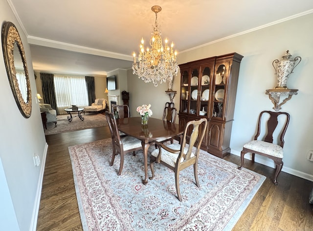 6005 Hancock Dr Unit 6005, Danbury, CT 06811 - dining room featuring a chandelier, dark wood-style floors, and crown molding