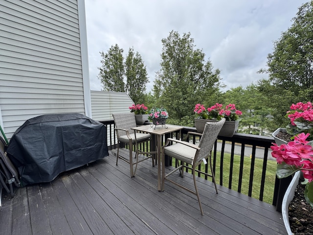 6005 Hancock Dr Unit 6005, Danbury, CT 06811 - wooden deck with outdoor dining area and grilling area