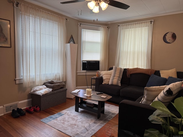 34 Oak St, Thomaston, CT 06787 - living room with ceiling fan, wood finished floors, cooling unit, and crown molding