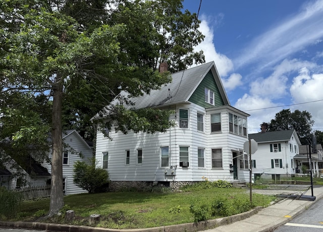 34 Oak St, Thomaston, CT 06787 - view of home's exterior featuring a chimney