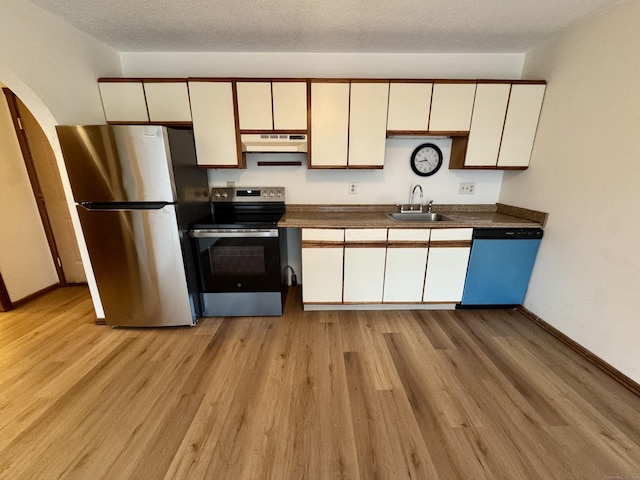 24 W Rd Apt 2, Ellington, CT 06029 - kitchen featuring freestanding refrigerator, under cabinet range hood, range with electric stovetop, dishwasher, and white cabinets