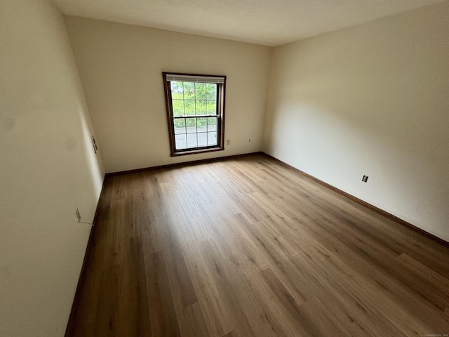 24 W Rd Apt 2, Ellington, CT 06029 - empty room featuring wood finished floors and baseboards