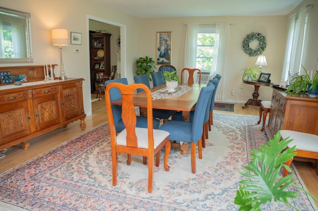 95 Holly Mar Hill Rd, North Branford, CT 06472 - dining area with light wood-type flooring and baseboards