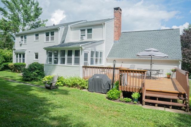95 Holly Mar Hill Rd, North Branford, CT 06472 - back of house with a chimney, a wooden deck, a yard, and a shingled roof