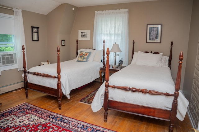 95 Holly Mar Hill Rd, North Branford, CT 06472 - bedroom featuring wood finished floors and a baseboard heating unit