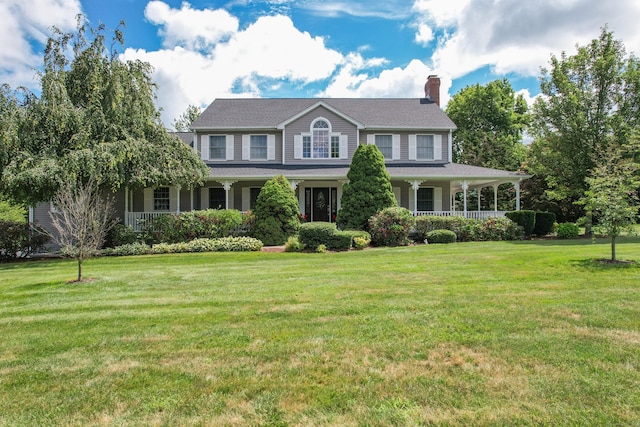 12 Marc Dr, Watertown, CT 06795 - colonial-style house with a chimney, covered porch, and a front yard
