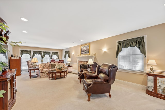 12 Marc Dr, Watertown, CT 06795 - living room with light carpet, a glass covered fireplace, and recessed lighting
