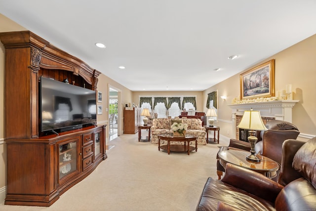 12 Marc Dr, Watertown, CT 06795 - living area featuring a glass covered fireplace, light carpet, and recessed lighting