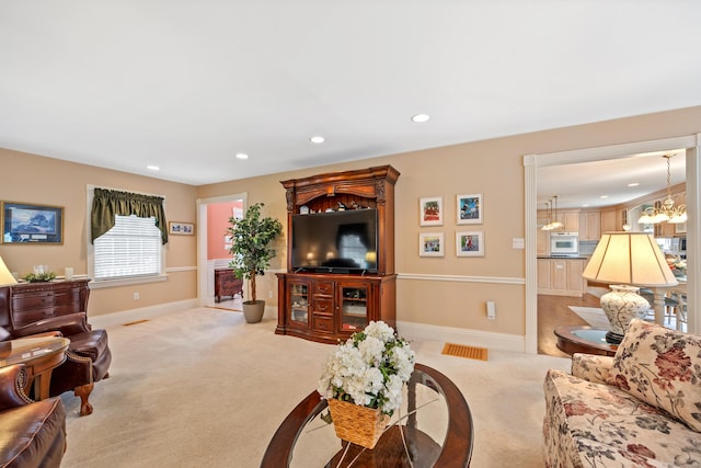 12 Marc Dr, Watertown, CT 06795 - living area featuring carpet, recessed lighting, and a chandelier