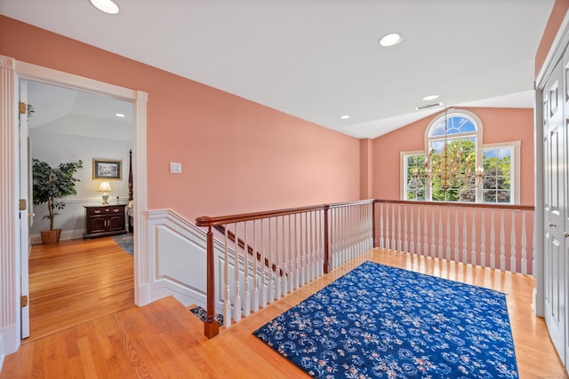 12 Marc Dr, Watertown, CT 06795 - hallway with an upstairs landing, lofted ceiling, light wood-style floors, and recessed lighting