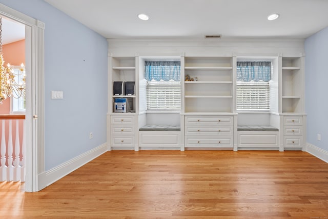 12 Marc Dr, Watertown, CT 06795 - unfurnished room with healthy amount of natural light, a chandelier, light wood-style floors, and recessed lighting