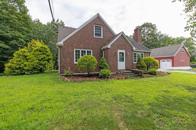 534 Norwich Ave, Colchester, CT 06415 - view of front of property featuring brick siding, a chimney, a front yard, and an outdoor structure