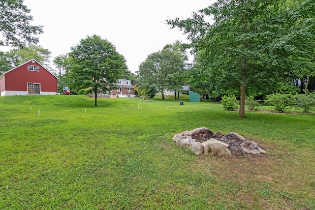 534 Norwich Ave, Colchester, CT 06415 - view of green lawn featuring an outdoor structure
