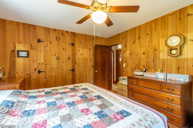 534 Norwich Ave, Colchester, CT 06415 - bedroom featuring wood walls and a ceiling fan