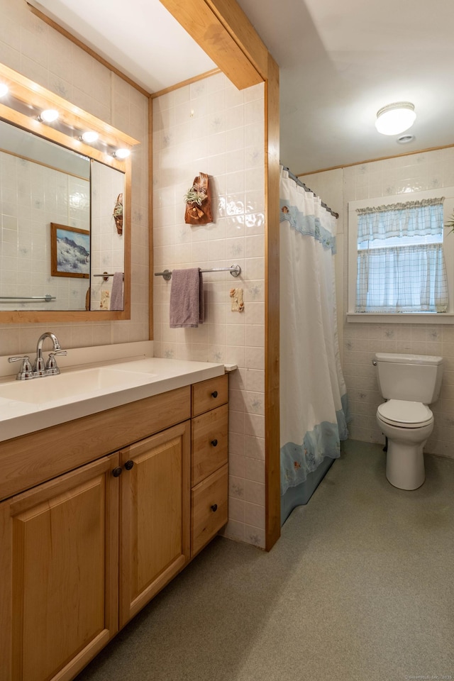 534 Norwich Ave, Colchester, CT 06415 - full bath featuring tile walls, vanity, and a shower with shower curtain