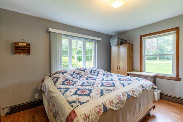 534 Norwich Ave, Colchester, CT 06415 - bedroom featuring light wood finished floors and a baseboard radiator