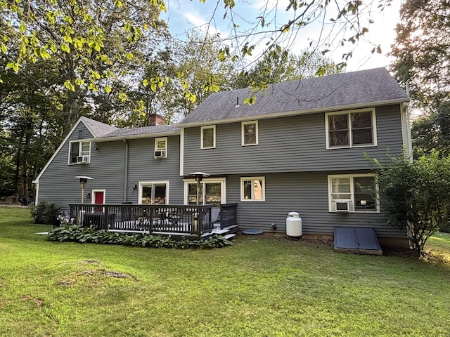 11 Obed Hts, Old Saybrook, CT 06475 - rear view of house with a wooden deck, a lawn, and a chimney