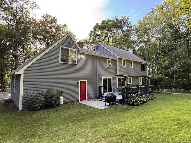 11 Obed Hts, Old Saybrook, CT 06475 - back of property with a yard, a chimney, a deck, and a patio area