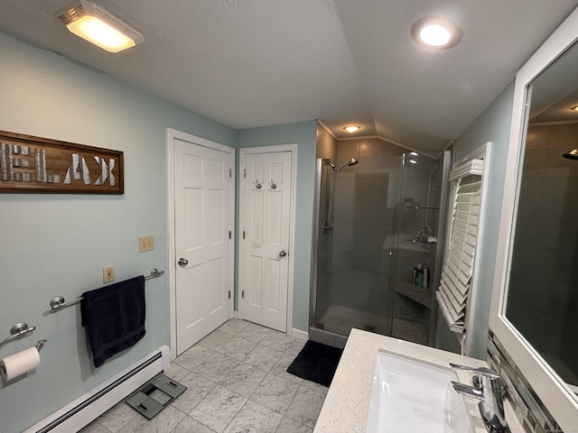 11 Obed Hts, Old Saybrook, CT 06475 - full bath with baseboard heating, a shower stall, vanity, a closet, and vaulted ceiling