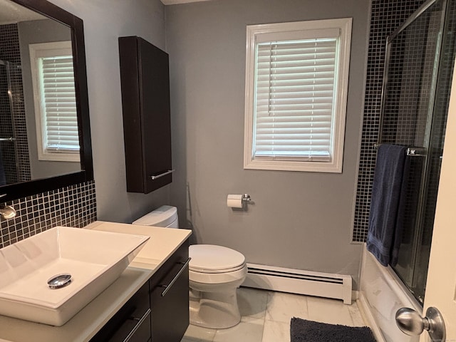 11 Obed Hts, Old Saybrook, CT 06475 - full bath featuring a baseboard heating unit, vanity, marble finish floors, shower / bath combination with glass door, and backsplash