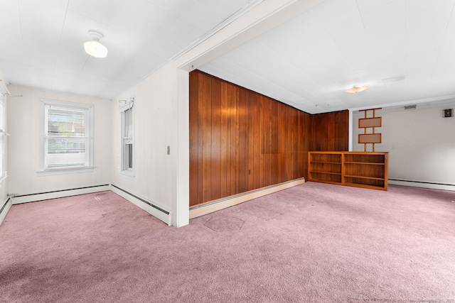 205 Old Norwich Rd, Waterford, CT 06375 - carpeted spare room featuring a baseboard heating unit and wooden walls