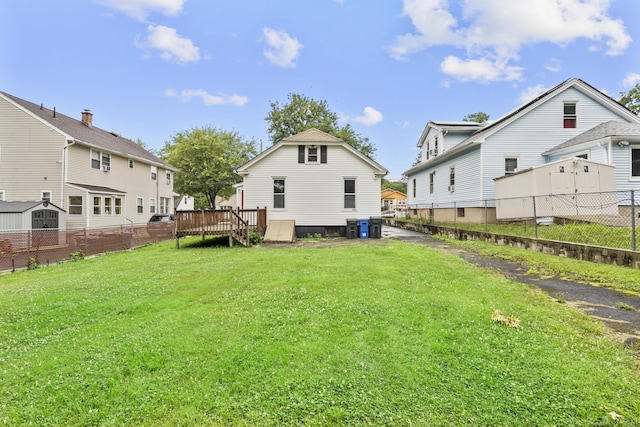 173 Euclid St W, Hartford, CT 06112 - rear view of house featuring a wooden deck