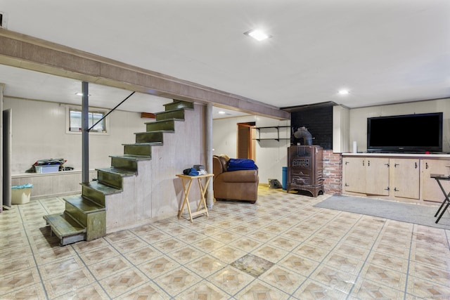 173 Euclid St W, Hartford, CT 06112 - basement with stairway, tile patterned flooring, a wood stove, and recessed lighting