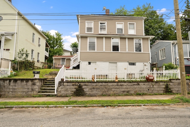 28 W High St, New London, CT 06320 - view of front facade featuring stairs and a chimney