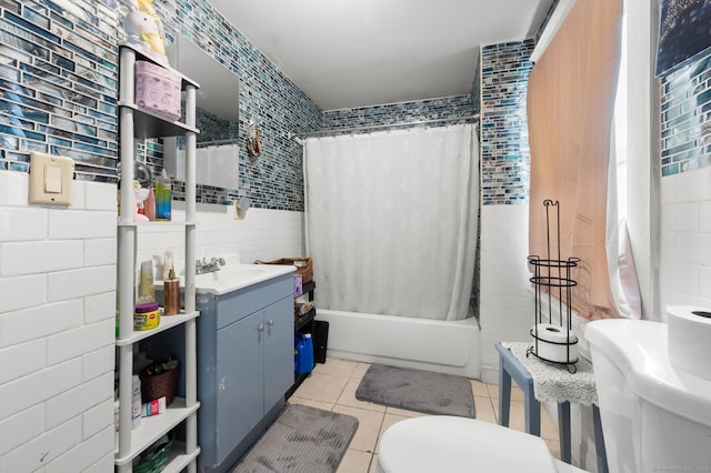 28 W High St, New London, CT 06320 - bathroom featuring tile walls, tile patterned flooring, shower / bathtub combination with curtain, and vanity