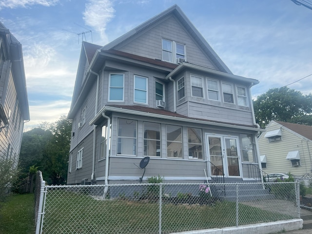 155 Summerfield Ave, Bridgeport, CT 06610 - view of front facade featuring a fenced front yard and cooling unit