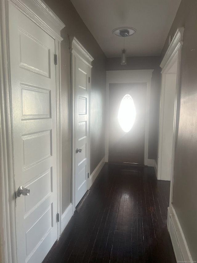 155 Summerfield Ave, Bridgeport, CT 06610 - hallway featuring dark wood-type flooring and baseboards