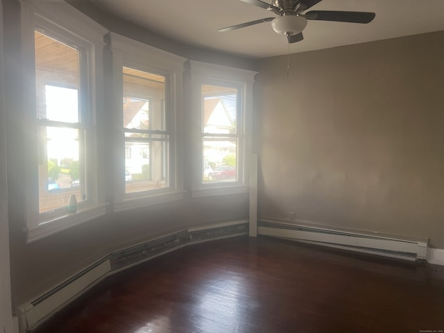 155 Summerfield Ave, Bridgeport, CT 06610 - spare room with baseboard heating, ceiling fan, and wood finished floors