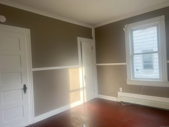 155 Summerfield Ave, Bridgeport, CT 06610 - empty room with wood finished floors, a baseboard radiator, and ornamental molding