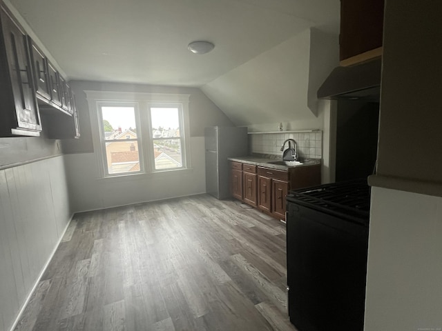 155 Summerfield Ave, Bridgeport, CT 06610 - bonus room with wood finished floors, a wainscoted wall, and vaulted ceiling